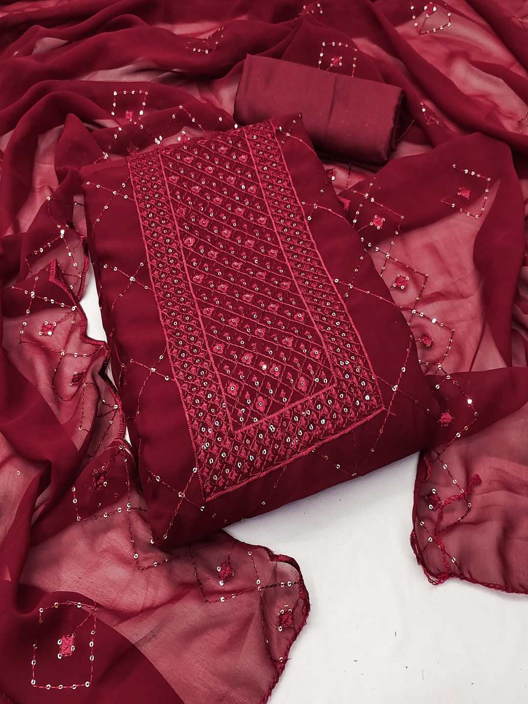 

Maroosh Geometric Embroidered Sequinned Unstitched Dress Material, Maroon