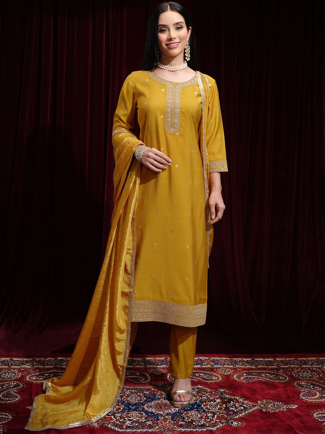 

Vishudh Floral Embroidered Sequinned Round Neck Straight Kurta with Palazzos & Dupatta, Mustard