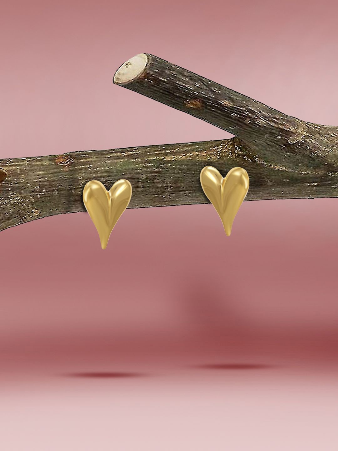 

Yinara Gold Plated Heart Shaped Studs Earrings