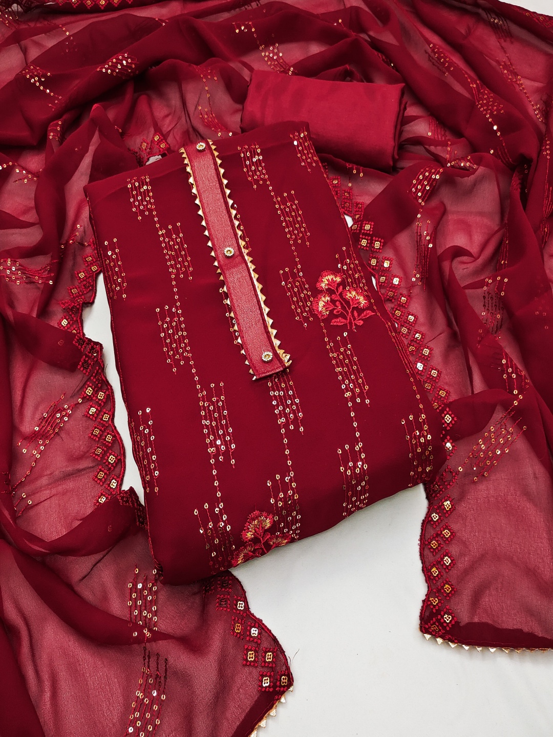 

Maroosh Floral Embroidered Sequinned Unstitched Dress Material, Maroon