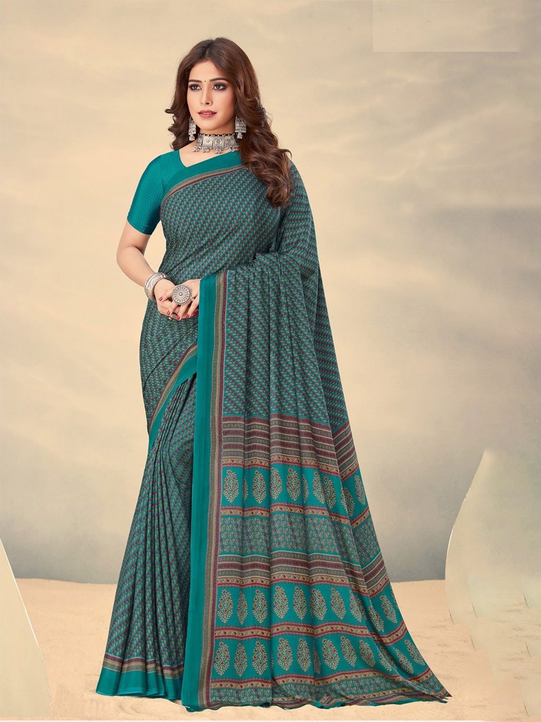 

Reboot Fashions Ethnic Motifs Printed Pure Crepe Saree, Teal