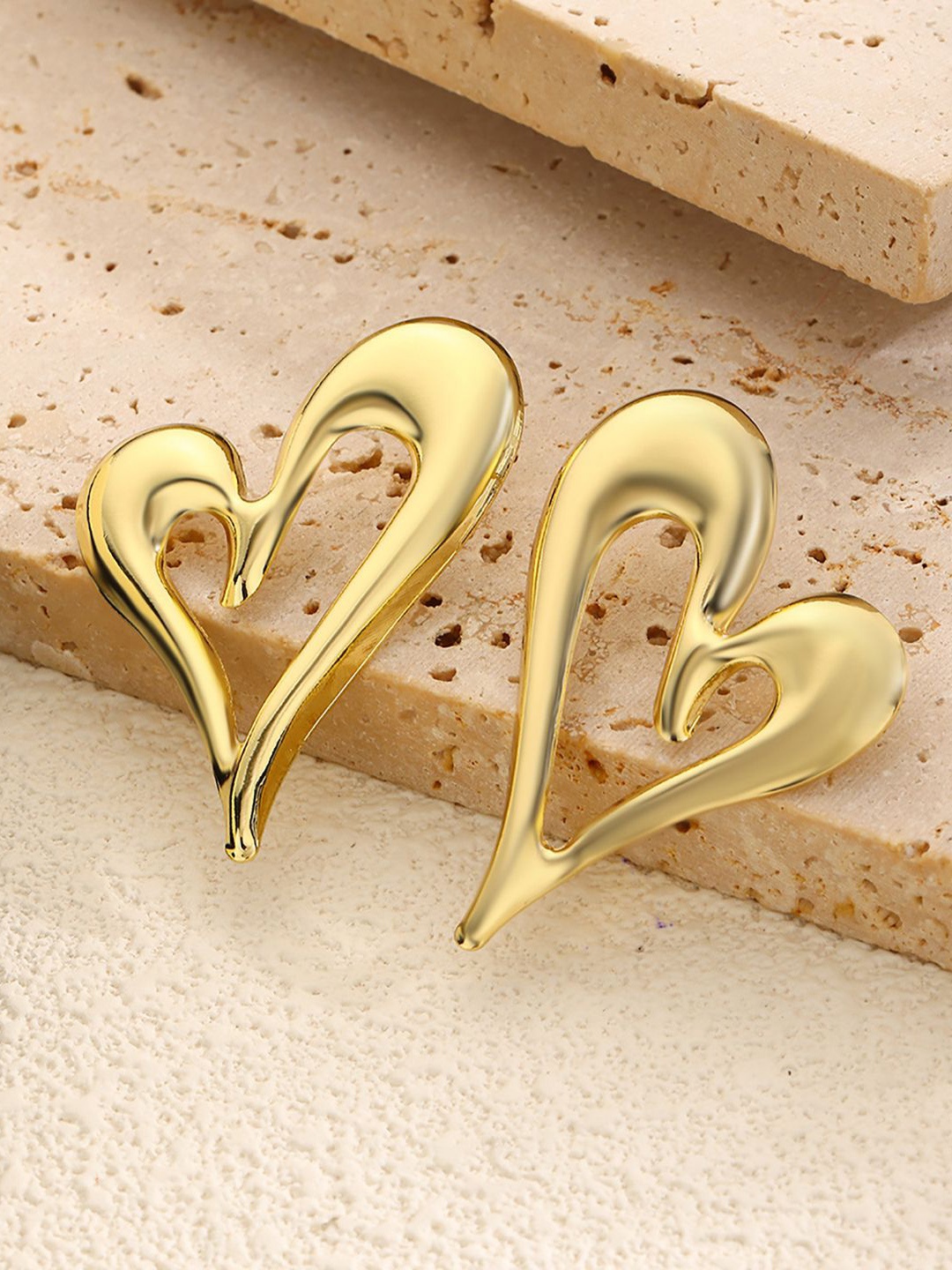 

StyleCast x Revolte Gold-Plated Heart Shaped Studs Earrings