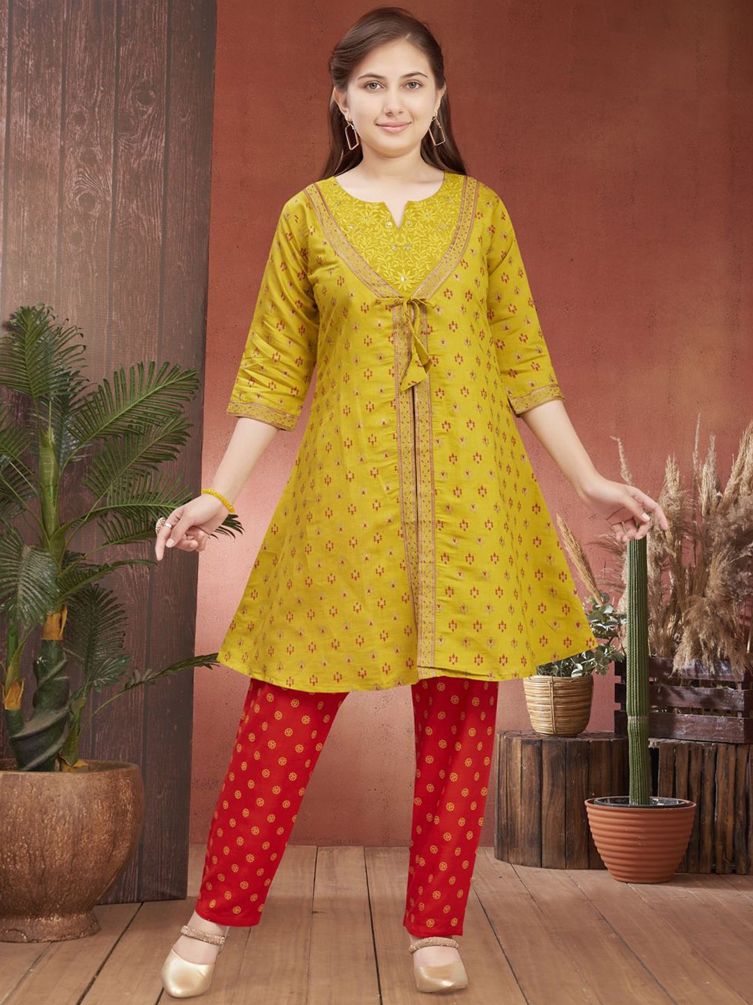 

Sangria Girls Ethnic Motifs Printed Notch Neck Pure Silk A-Line Kurta & Trouser, Mustard