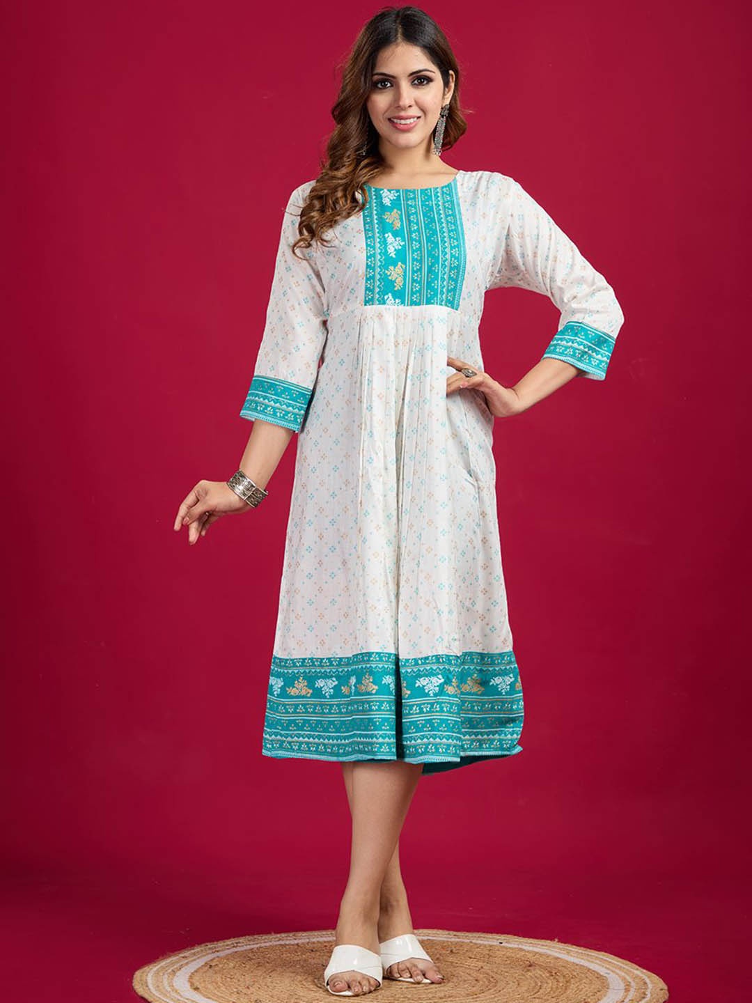 

A.V.M Prints Round Neck Floral Printed Fit and Flare Cotton Ethnic Dress, Turquoise blue