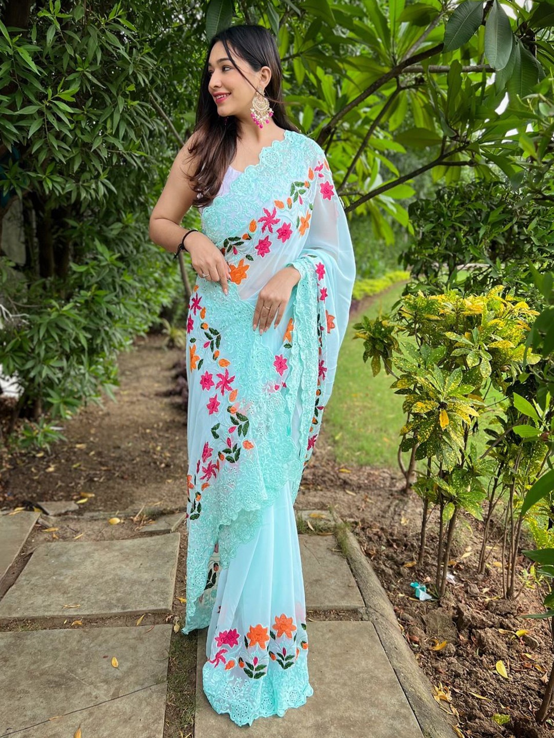 

Anouk Floral Embroidered Jaali Pure Georgette Saree, Turquoise blue