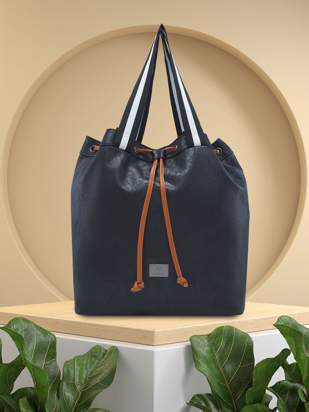 

Caprese Women Solid Shoulder Bag, Black