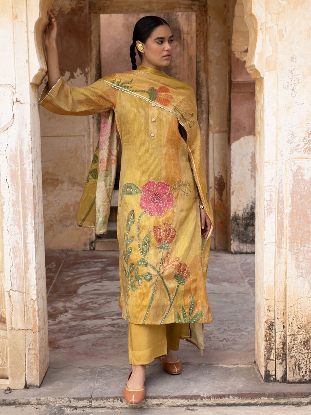 

KARAJ JAIPUR Women Floral Printed Chanderi Cotton Kurta with Trousers & With Dupatta, Mustard