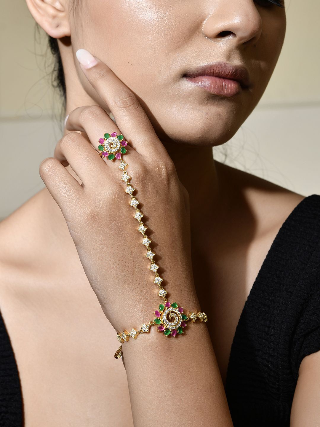 

Voylla Gold-Plated Sparkling Elegance Radiant Blooms AD Studded Hath Phool Ring Bracelet