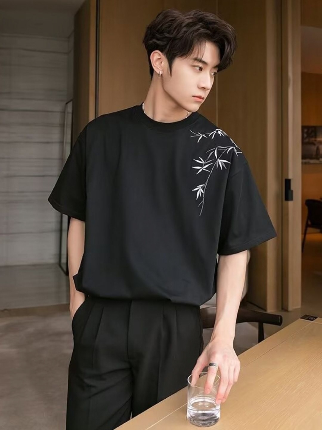 

HERE&NOW Men Graphic Printed Round Neck T-shirt, Black