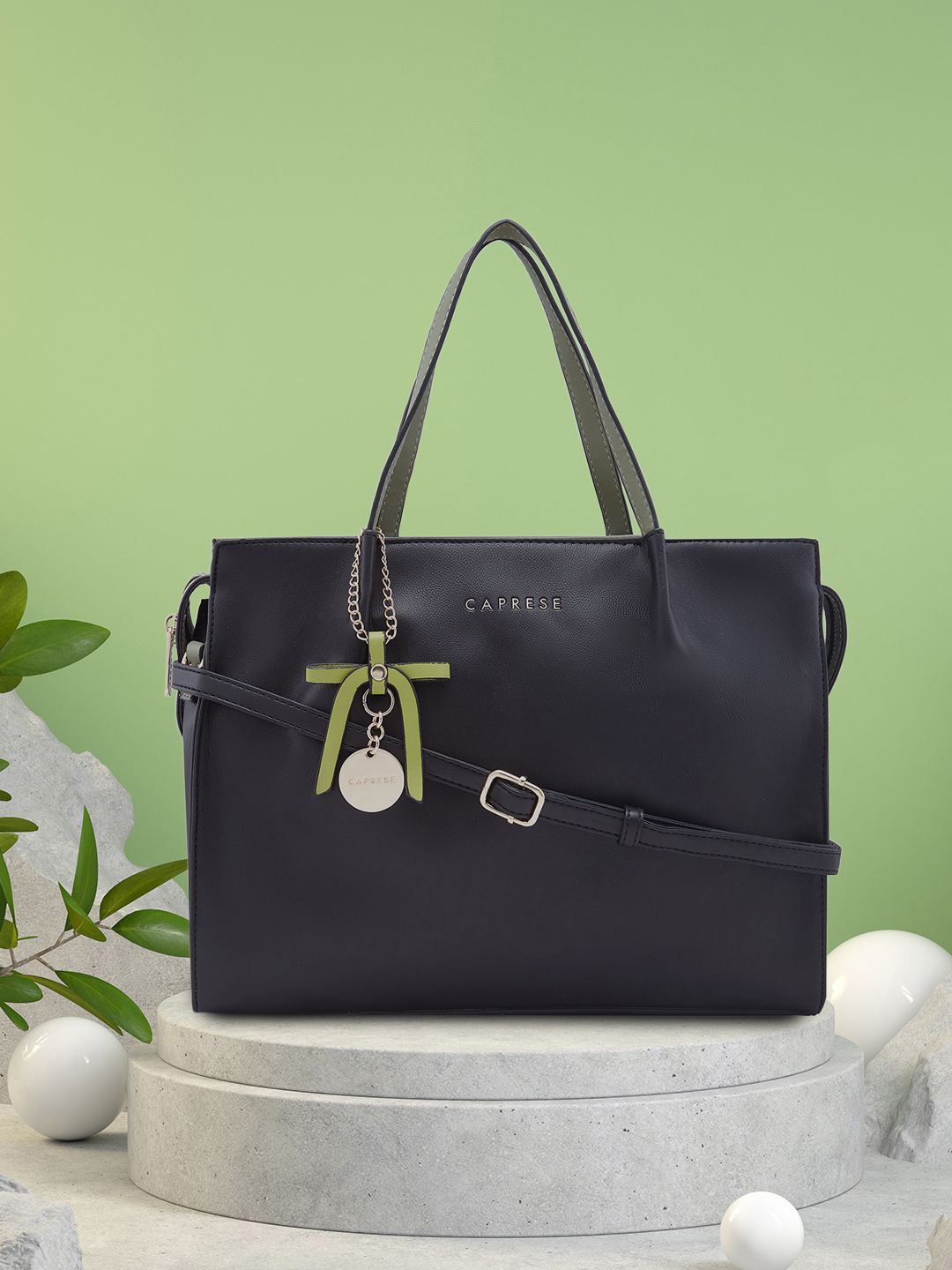

Caprese Women Solid Handheld Bag, Black