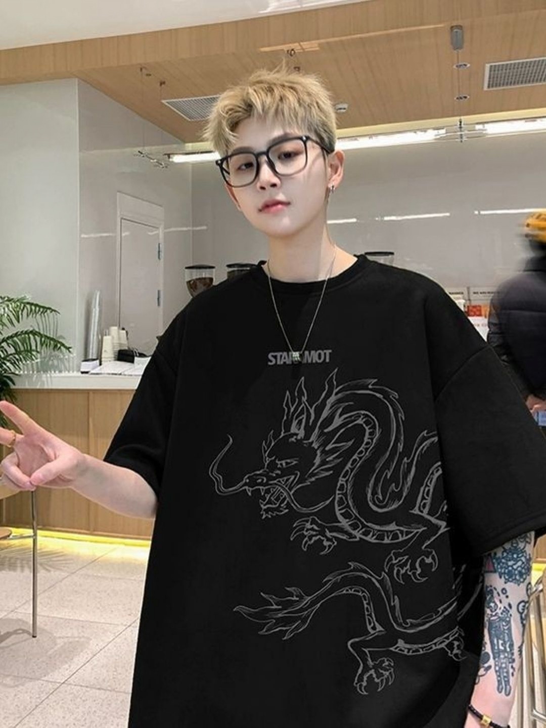 

HERE&NOW Men Graphic Printed Round Neck Oversized T-shirt, Black