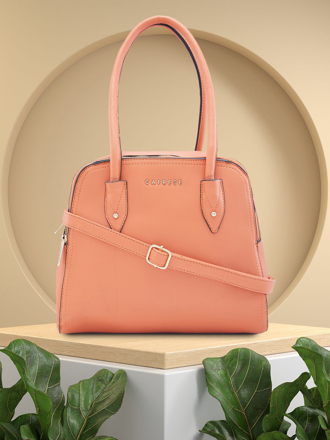 

Caprese Women Solid Shoulder Bag, Peach