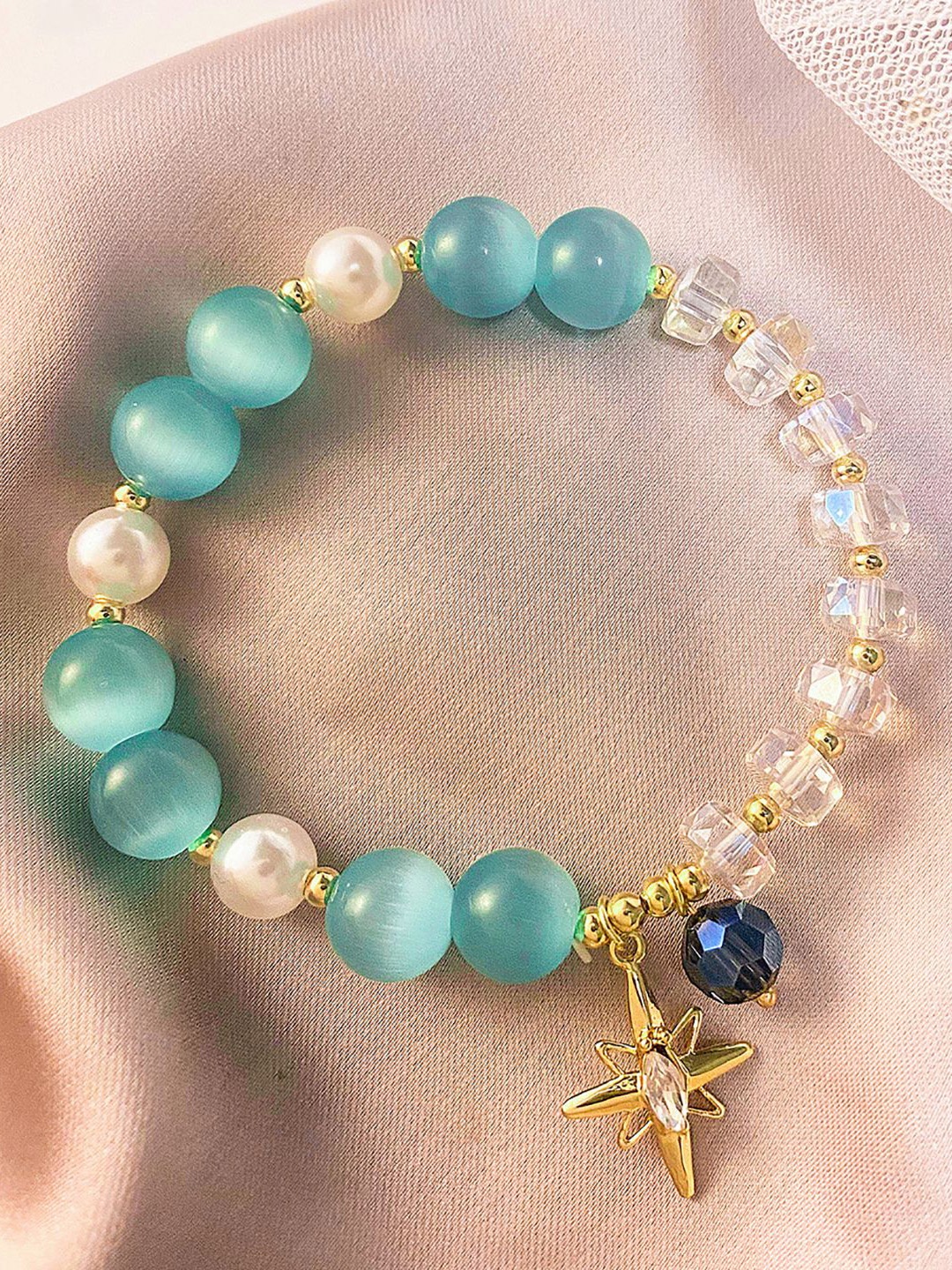 

StyleCast x Revolte Women Enamelled Gold-Plated Charm Bracelet