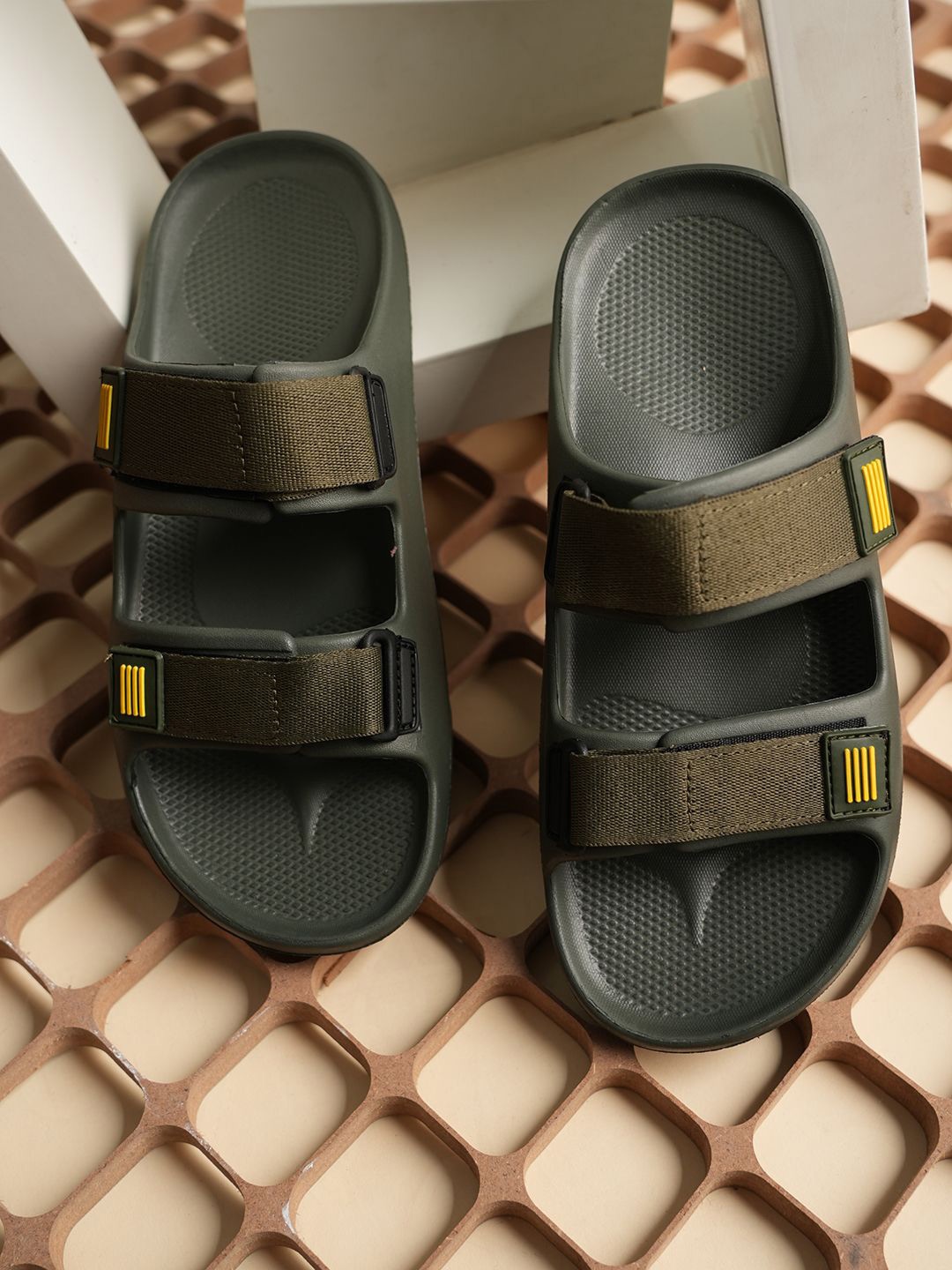 

The Roadster Lifestyle Co. Men Self Design Sliders, Olive