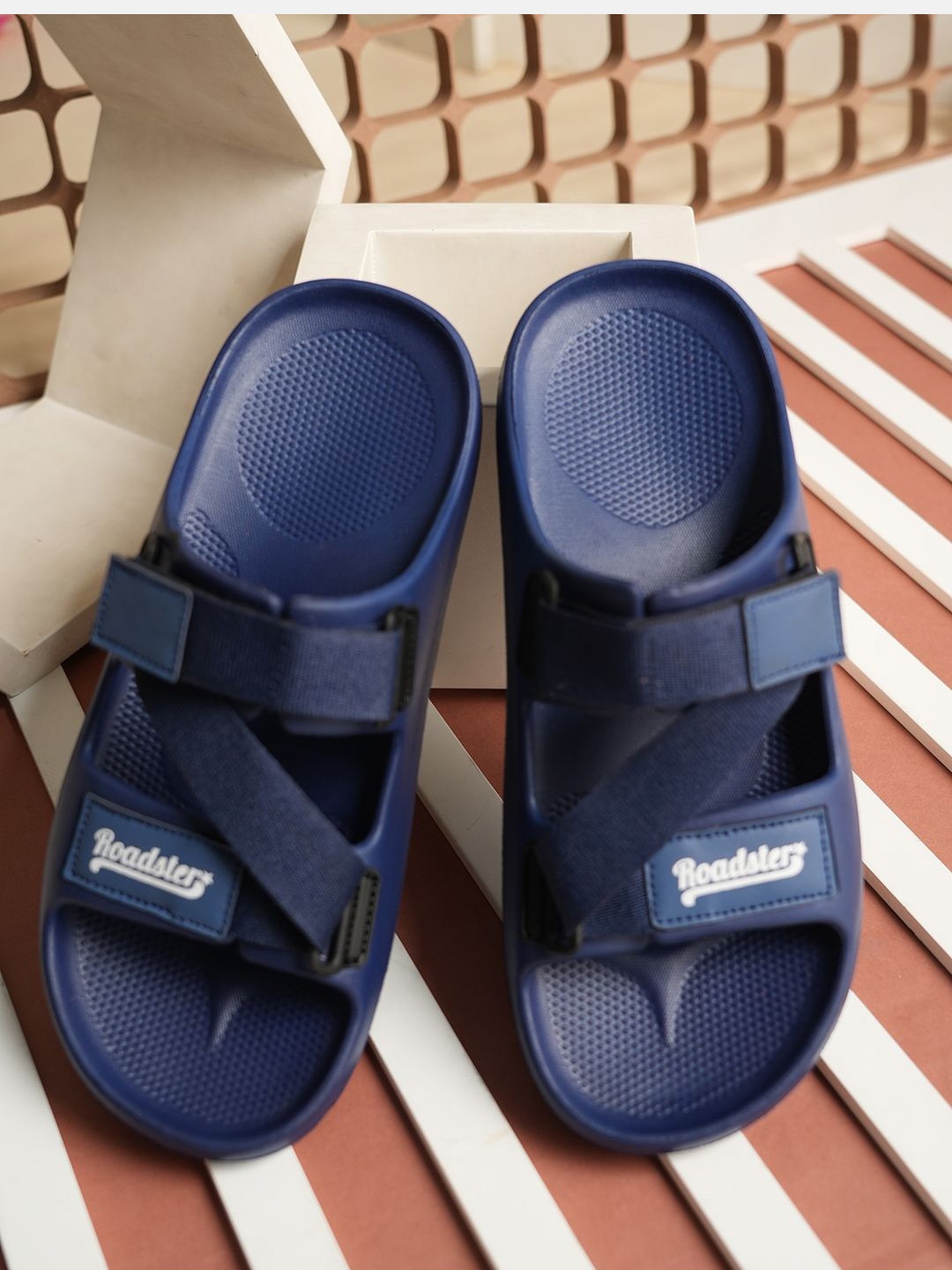 

The Roadster Lifestyle Co. Men Self Design Sliders, Navy blue