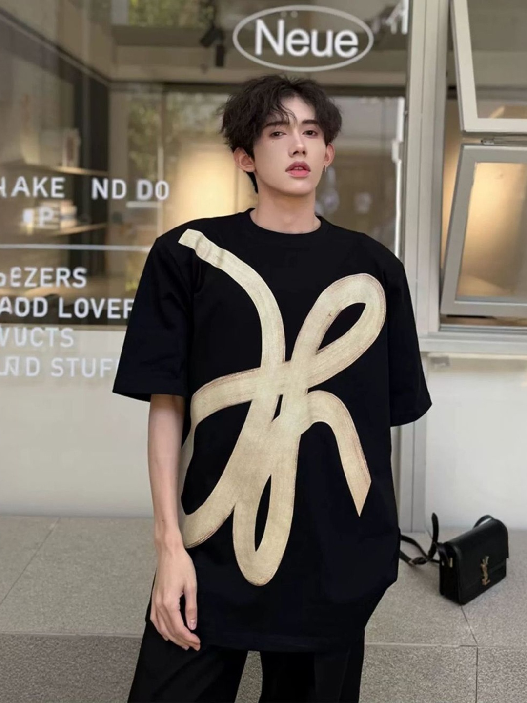 

HERE&NOW Men Graphic Printed Round Neck Cotton Oversized T-shirt, Black