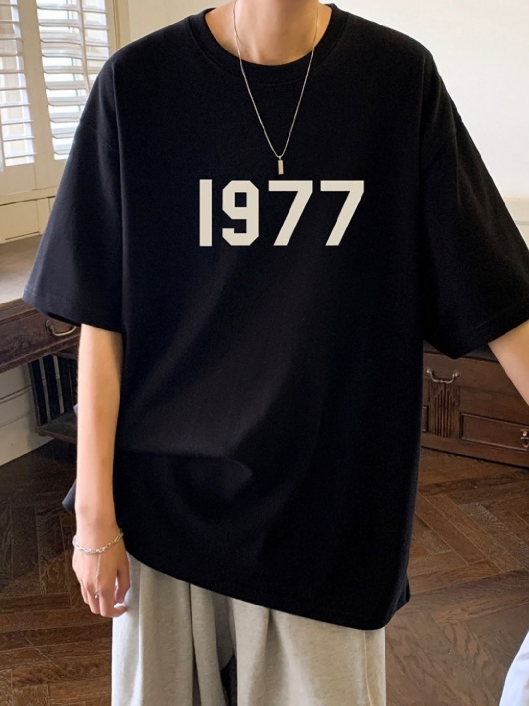 

HERE&NOW Men Typography Printed Round Neck Cotton Oversized T-shirt, Black