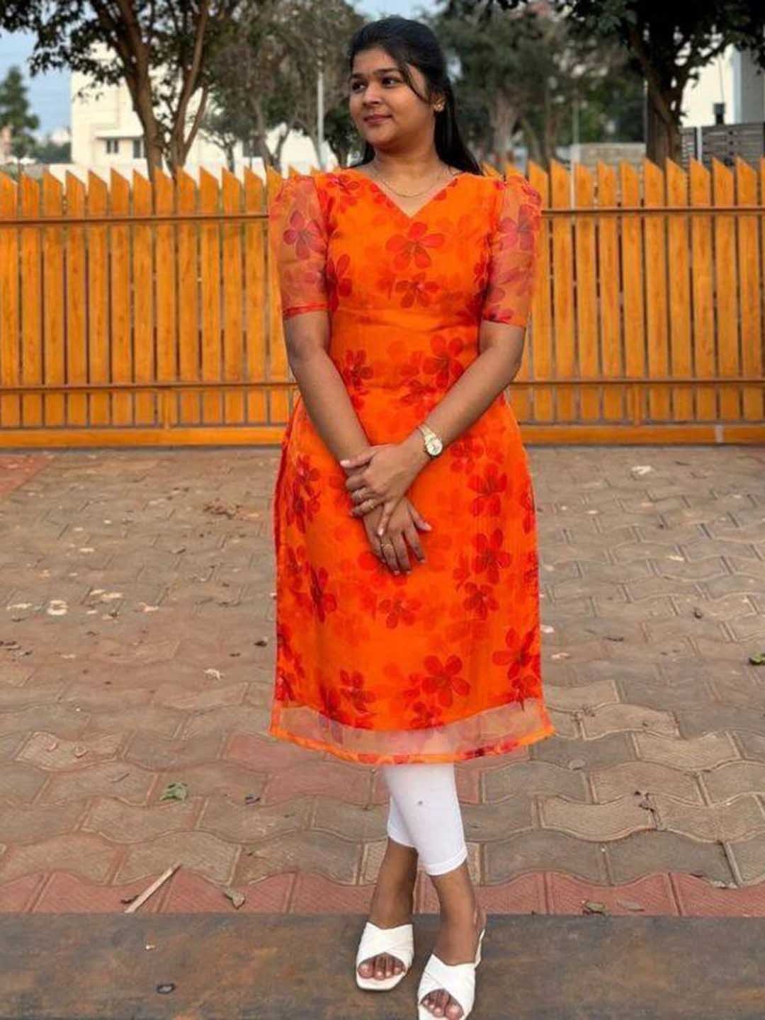 

Rujave Floral Printed Puff Sleeves Straight Kurta, Orange