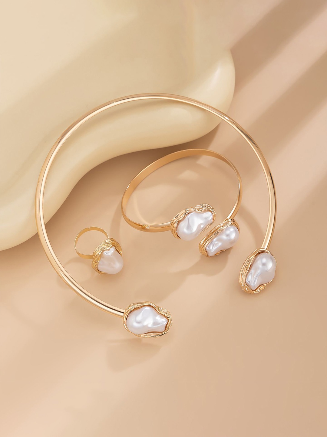 

StyleCast x Revolte Gold Plated Pearls Studded Jewellery Set