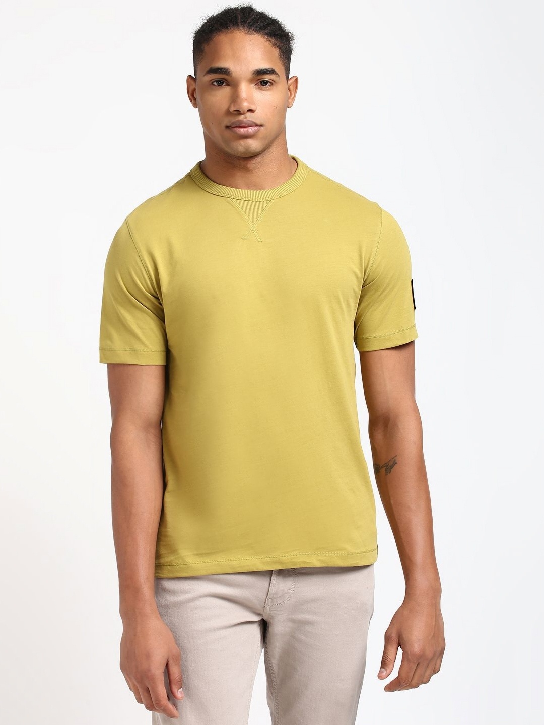 

Calvin Klein Jeans Men Solid Round Neck Cotton T-shirt, Yellow