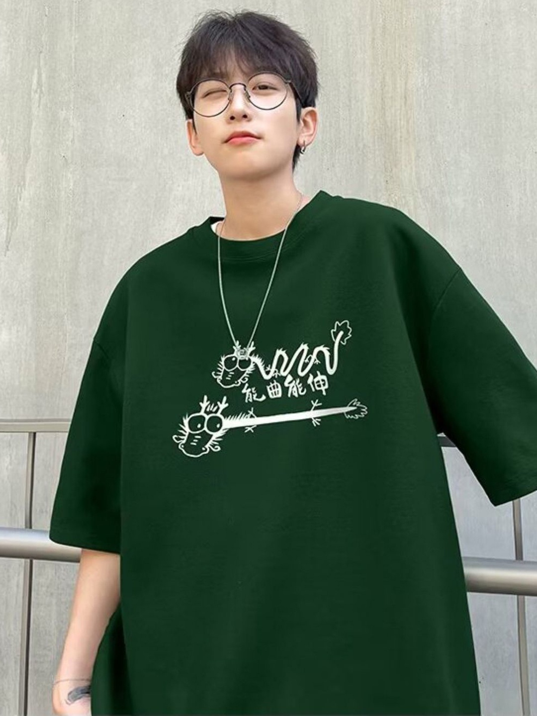 

HERE&NOW Men Graphic Printed Round Neck Oversized T-shirt, Green