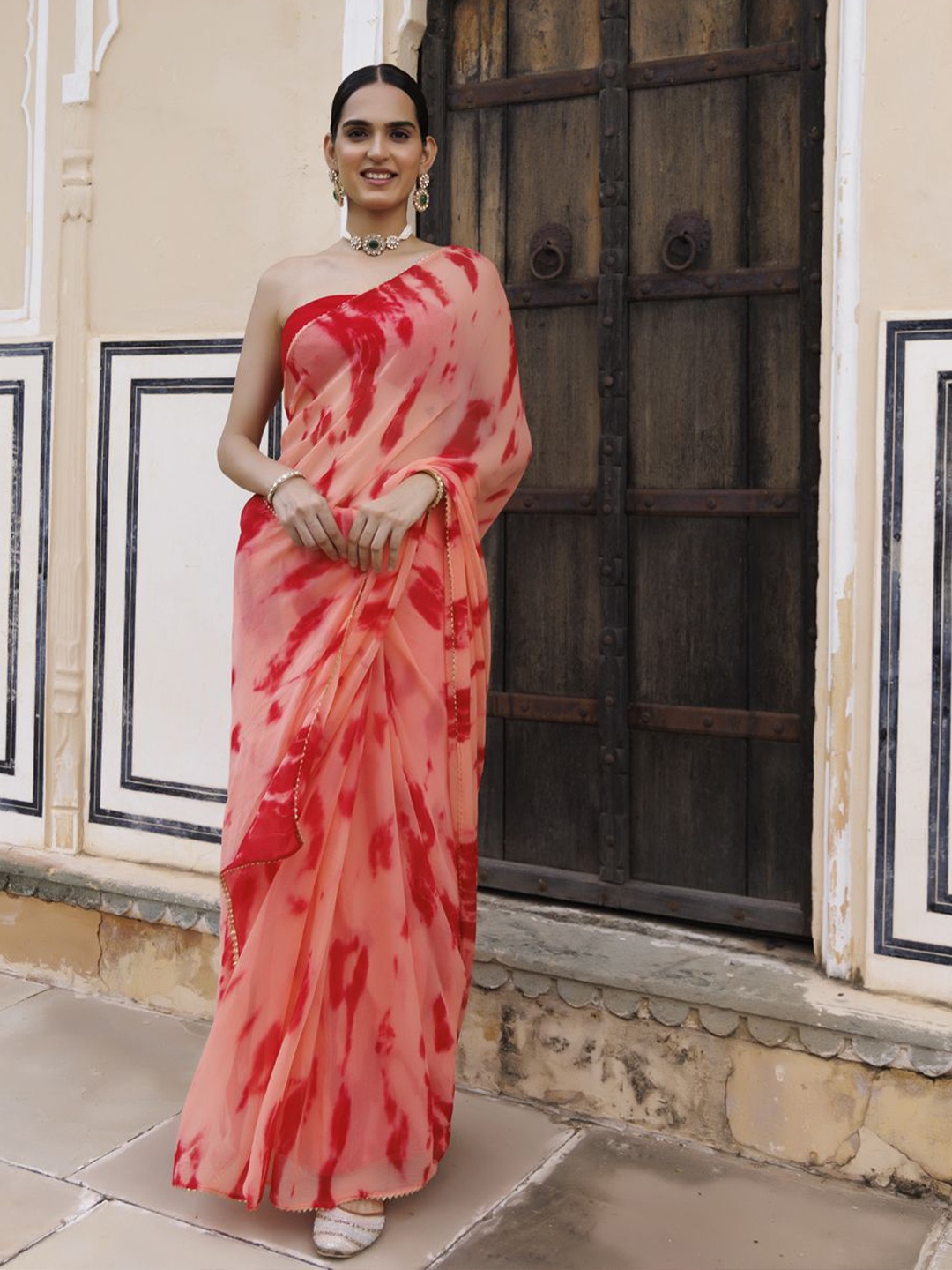 

Geroo Luxe Peach & Red Tie and Dye Saree