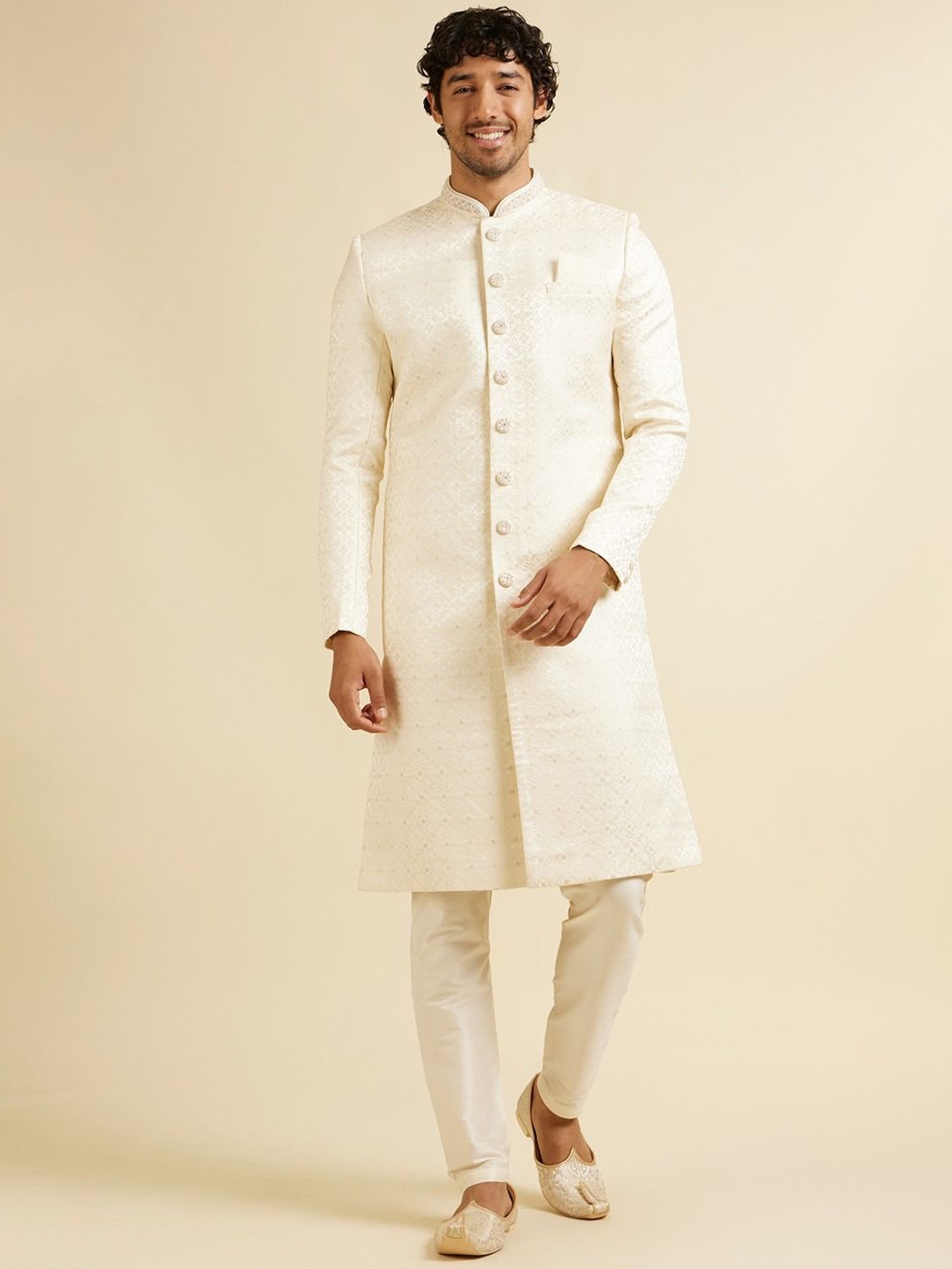 

Manyavar Men Self Designed Mandarin Collar Sherwani Set, Cream