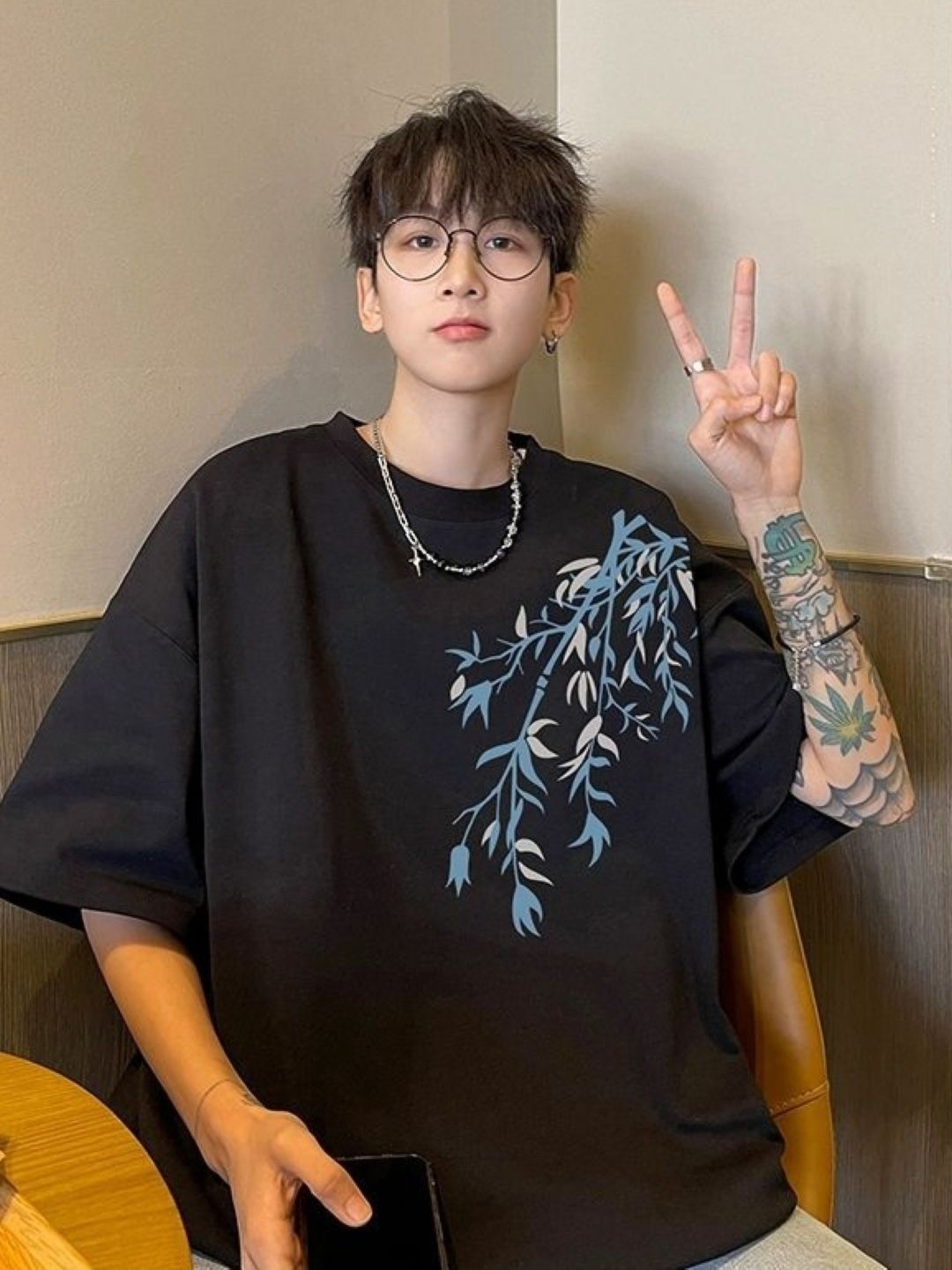 

HERE&NOW Men Floral Printed Round Neck Cotton Oversized T-shirt, Black