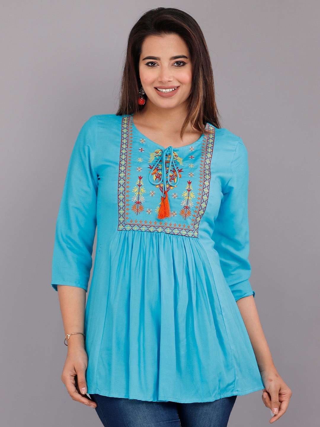 

Badthunia Fab Women Embroidered Tie-Up Neck A-Line Top, Blue