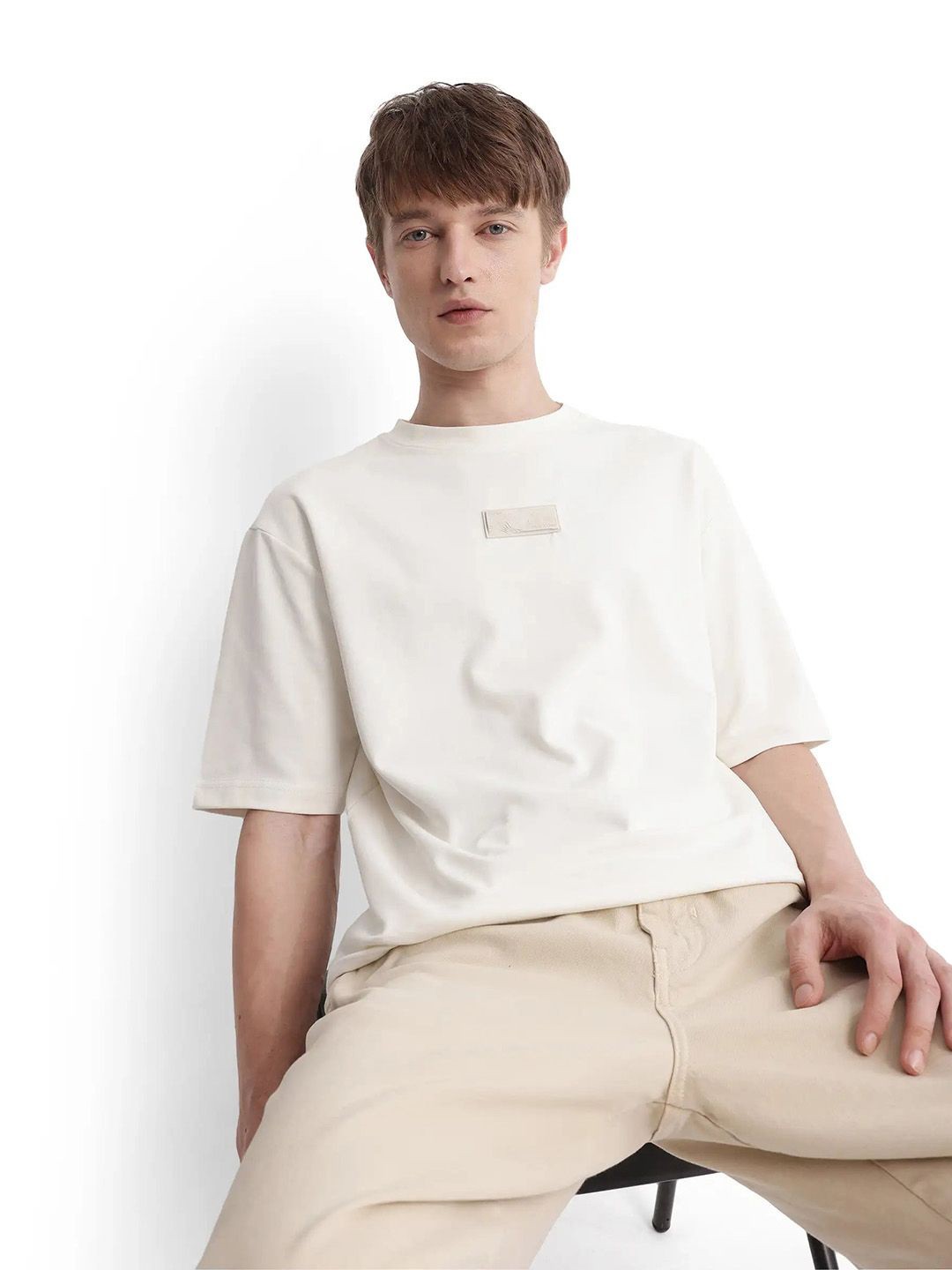 

RARE RABBIT Men Solid Round Neck Cotton Oversized T-shirt, Off white