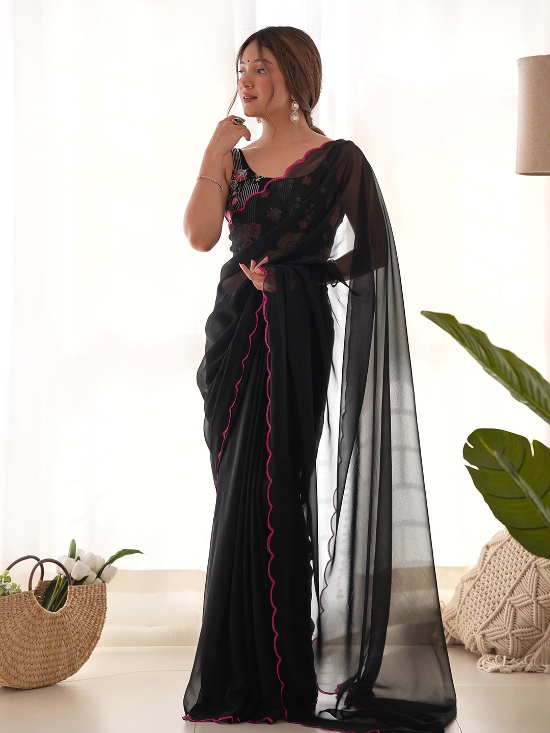 

Mitera Embroidered Border Solid Pure Georgette Saree, Black