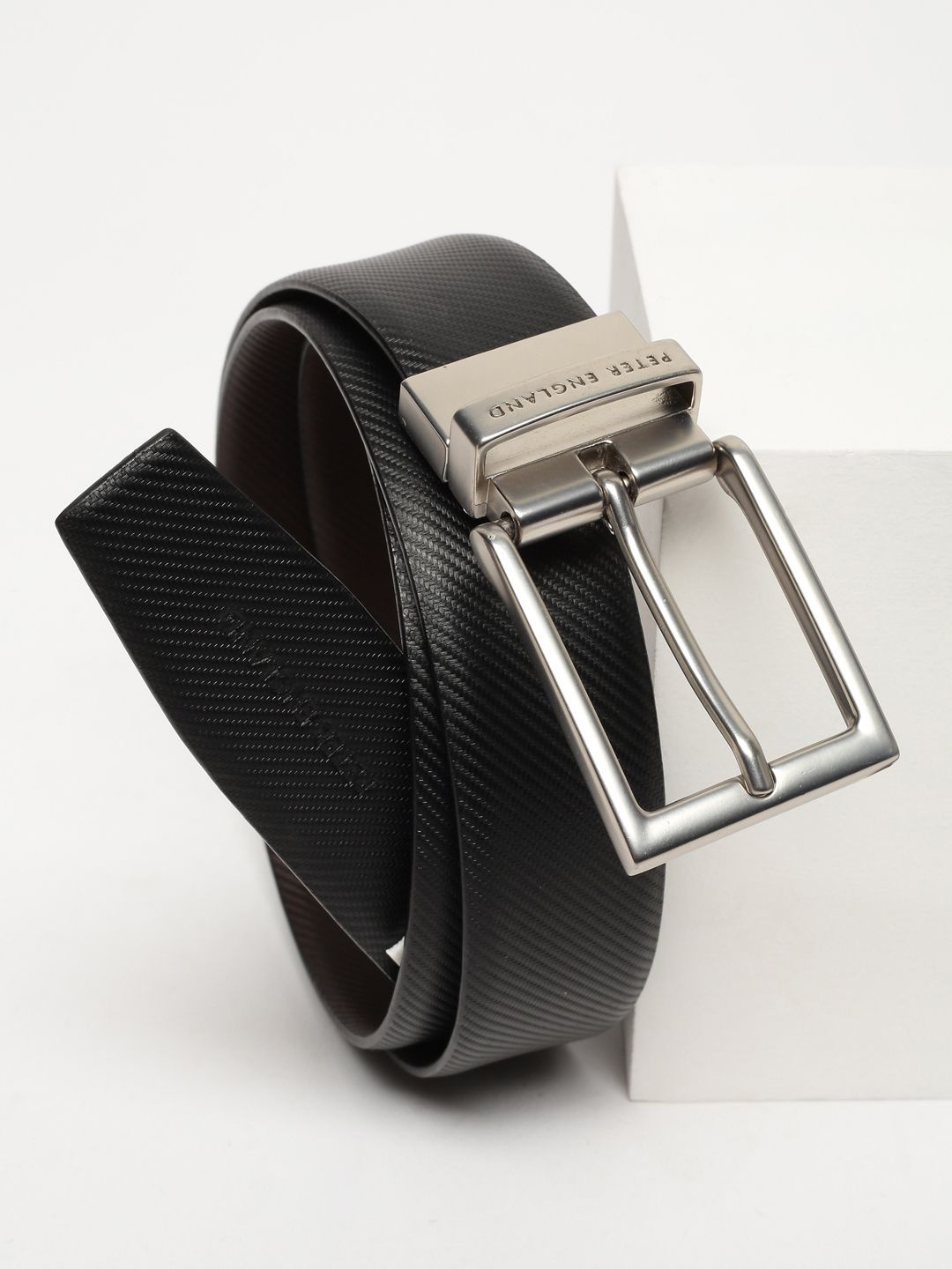 

Peter England Men Textured Leather Reversible Formal Belt, Black