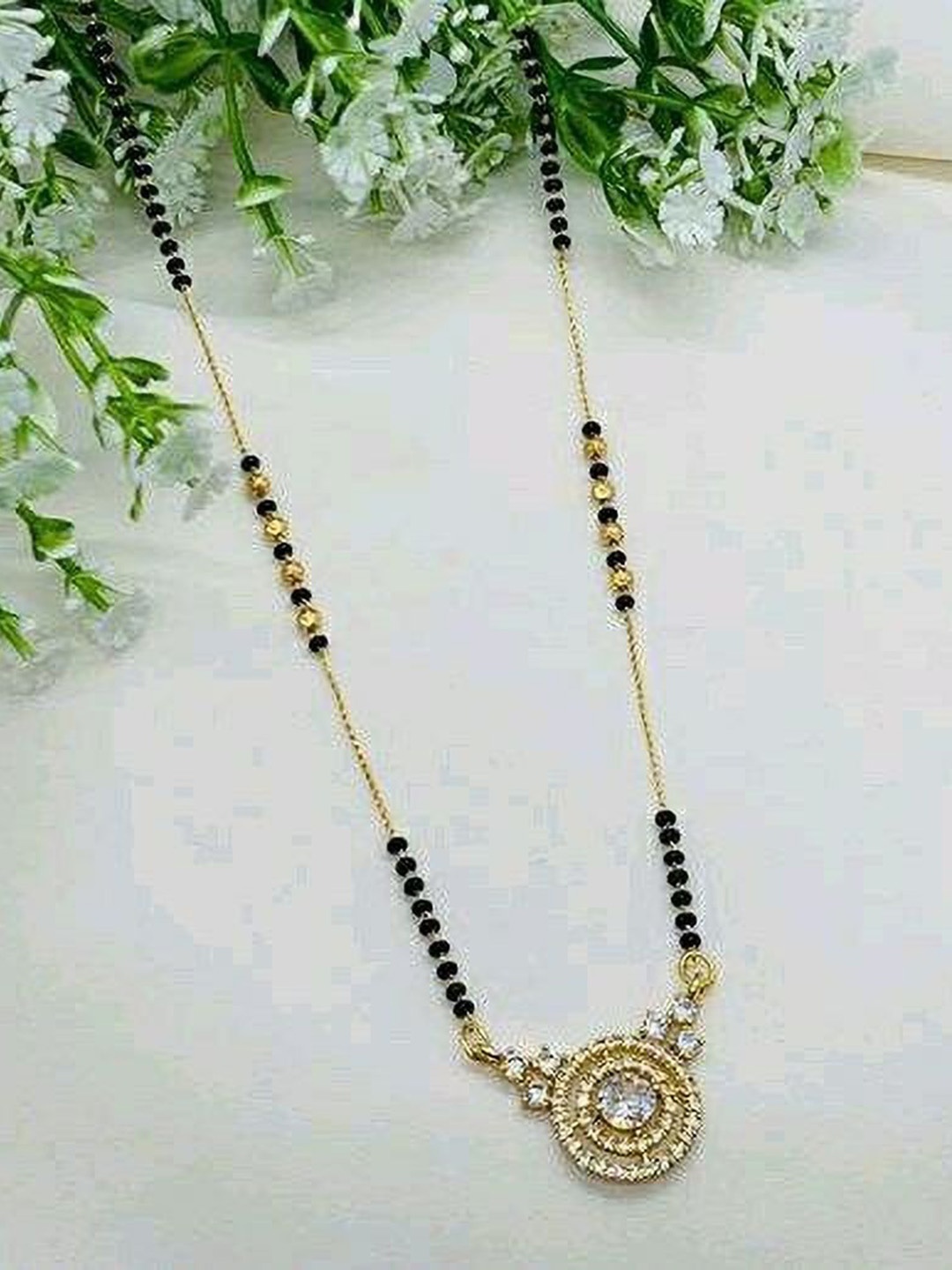 

Wynona Gold-Plated American Diamond & Beaded Tanmaniya Short Mangalsutra