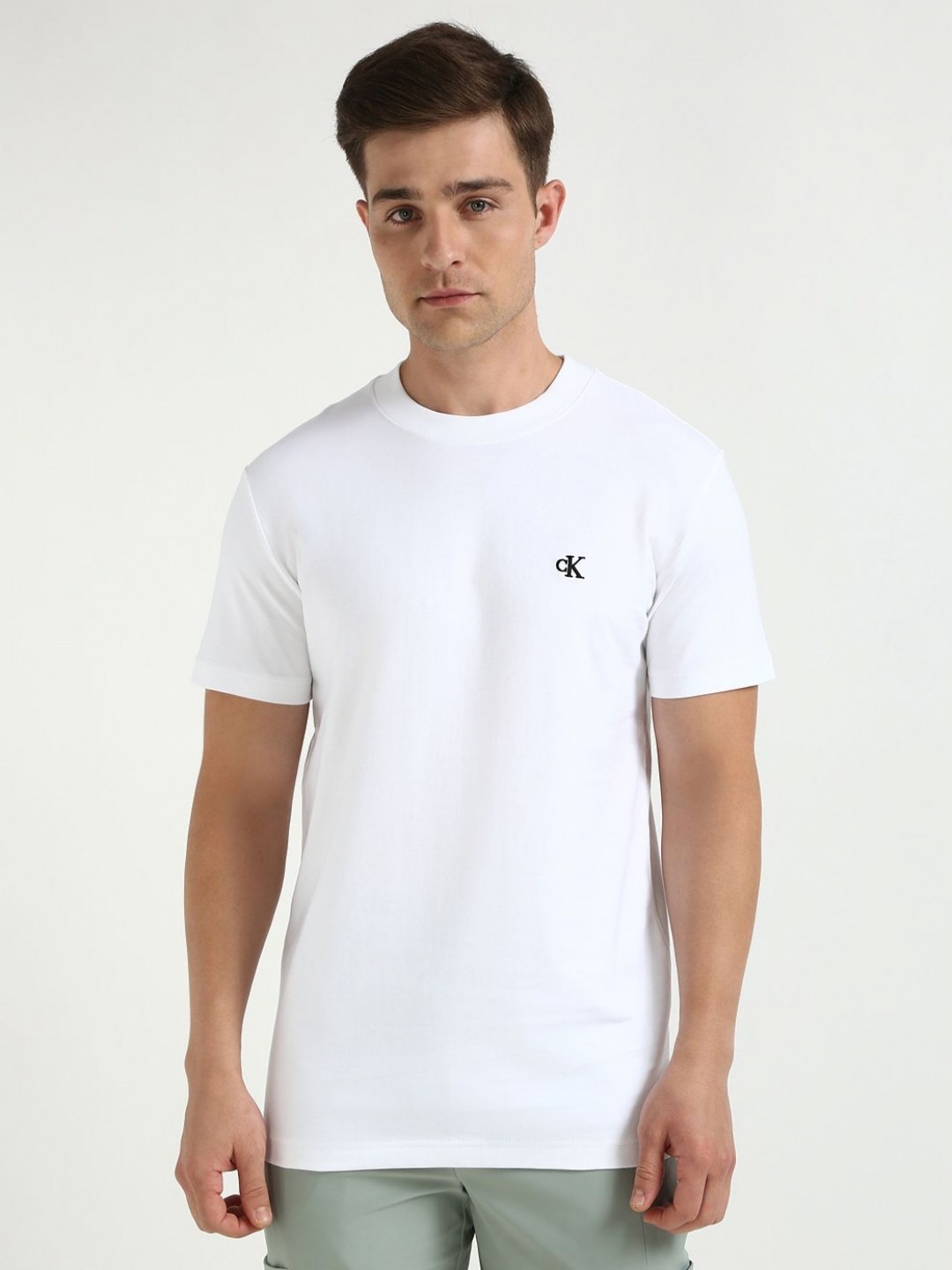 

Calvin Klein Jeans Men Solid Round Neck Cotton T-shirt, White