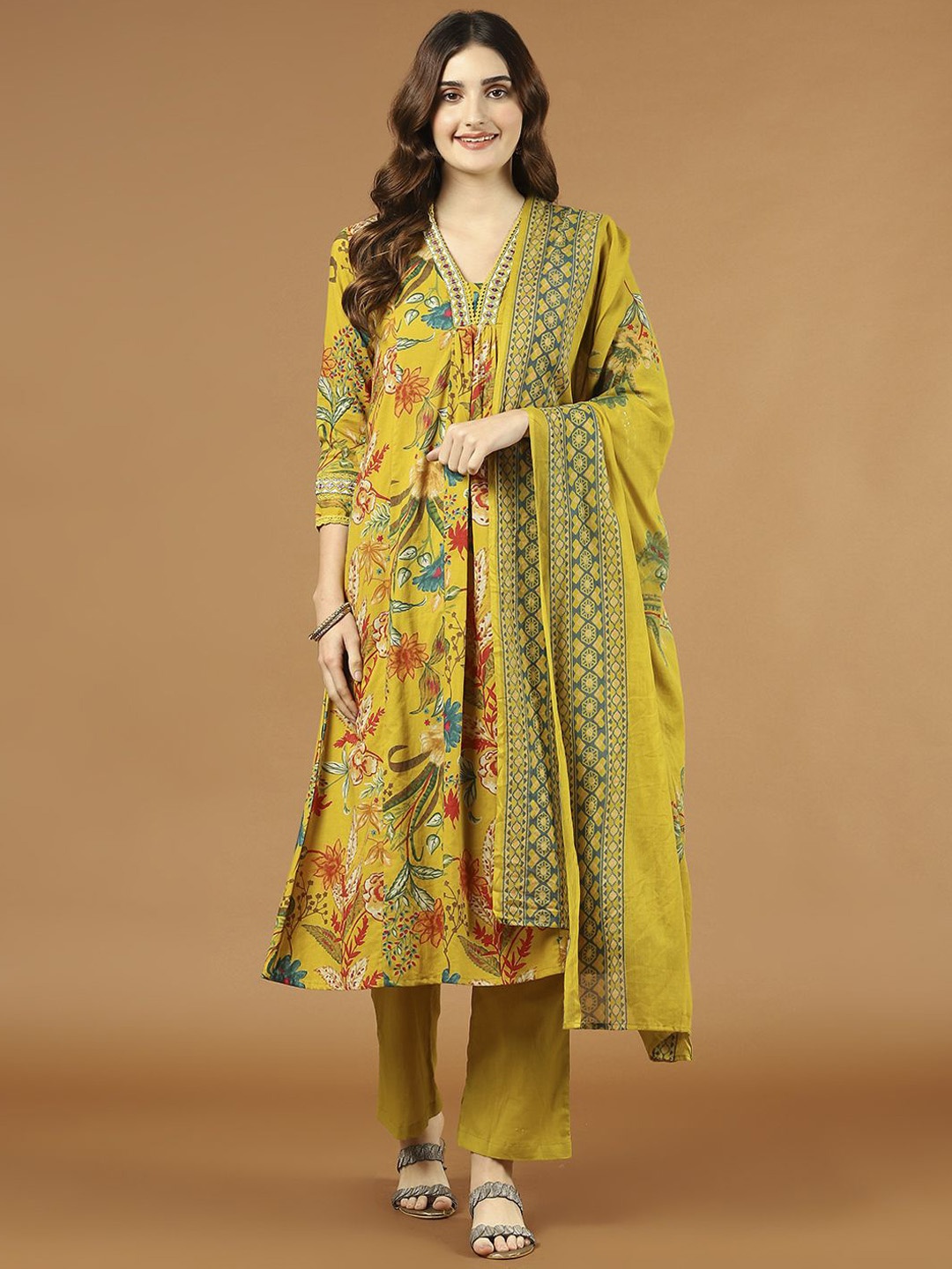 

Meena Bazaar Floral Printed V-Neck Regular Thread Work Kurta & Trouser & Dupatta, Mustard