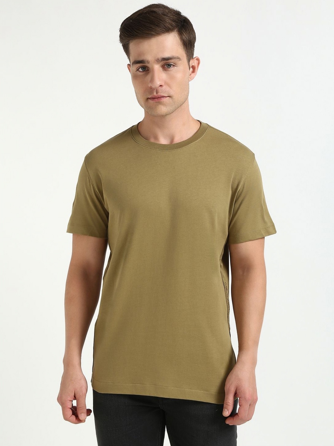 

Calvin Klein Jeans Men Solid Round Neck Cotton T-shirt, Olive