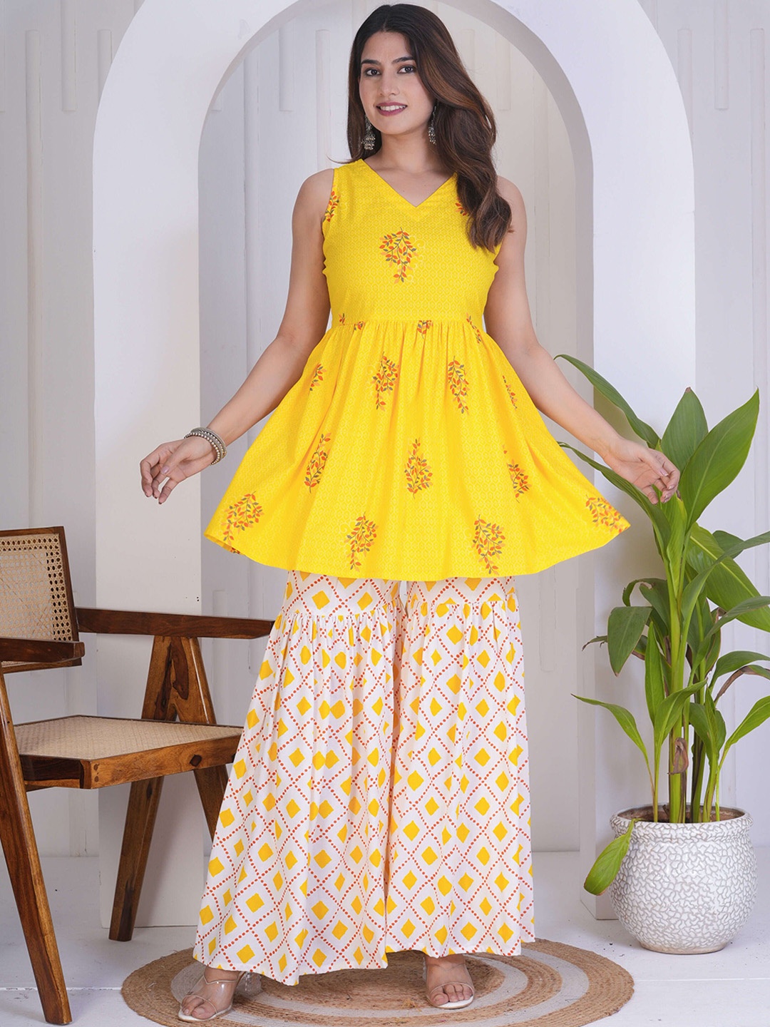 

KALINI V-Neck Floral Printed Pleated Anarkali Kurta with Sharara, Yellow