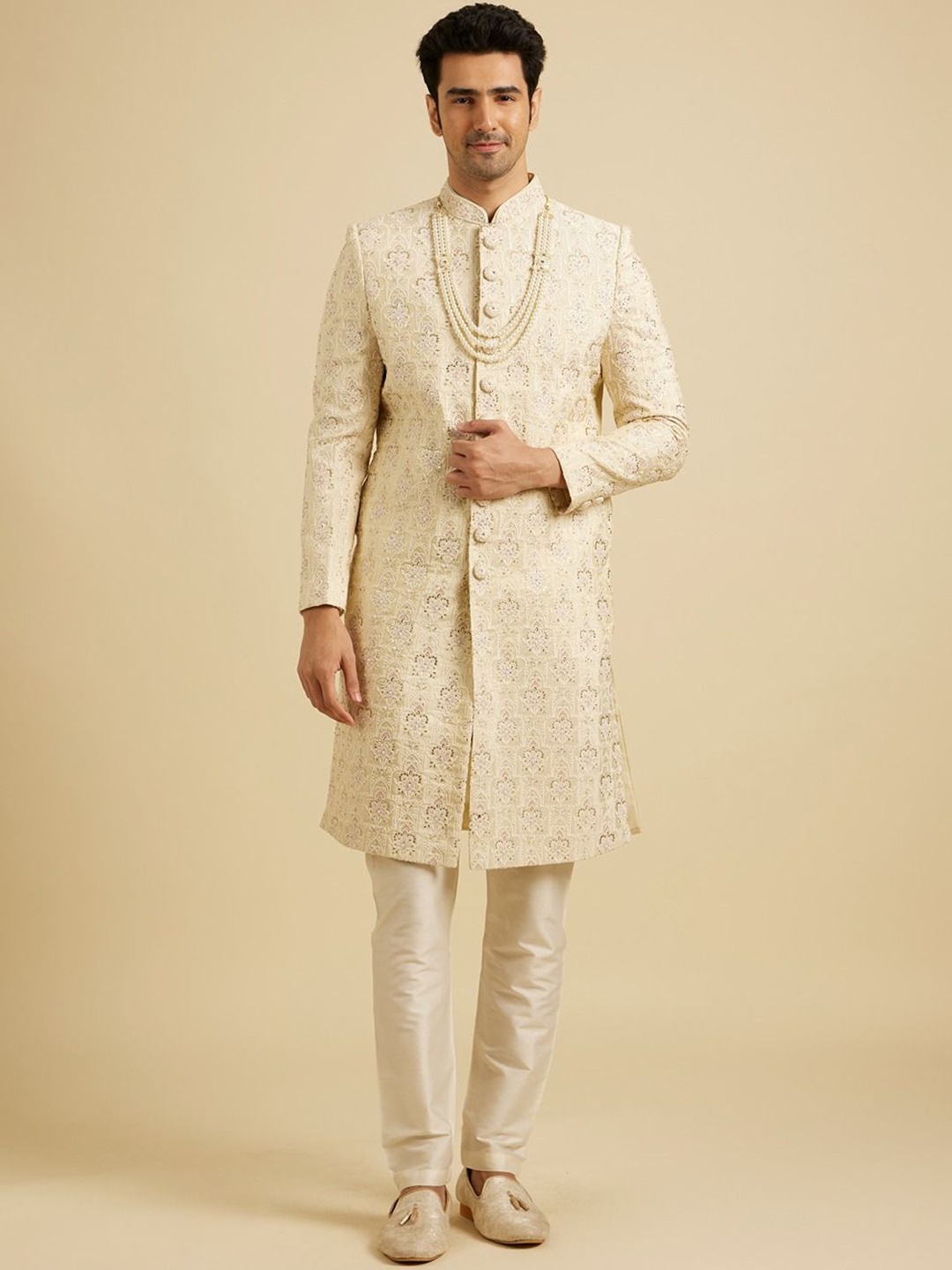 

Manyavar Men Embroidered Mirror Work Mandarin Collar Sherwani Set, Beige