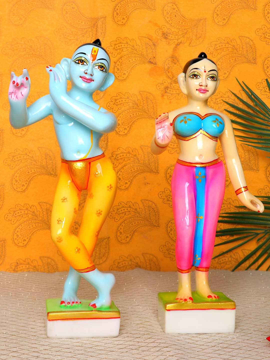 

GW CREATIONS White & Orange Radha Krishna Exquisite Marble Religious Idol Showpiece
