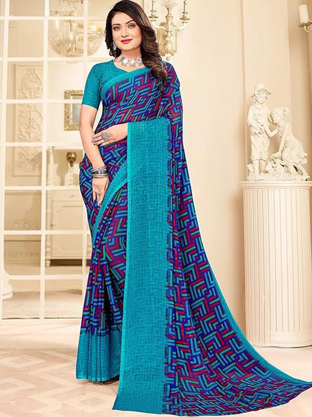 

Reboot Fashions Printed Pure Chiffon Saree, Blue