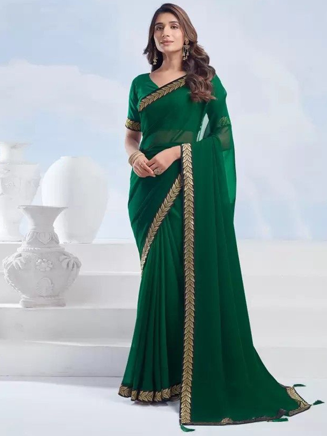 

Reboot Fashions Embellished Pure Georgette Saree, Green