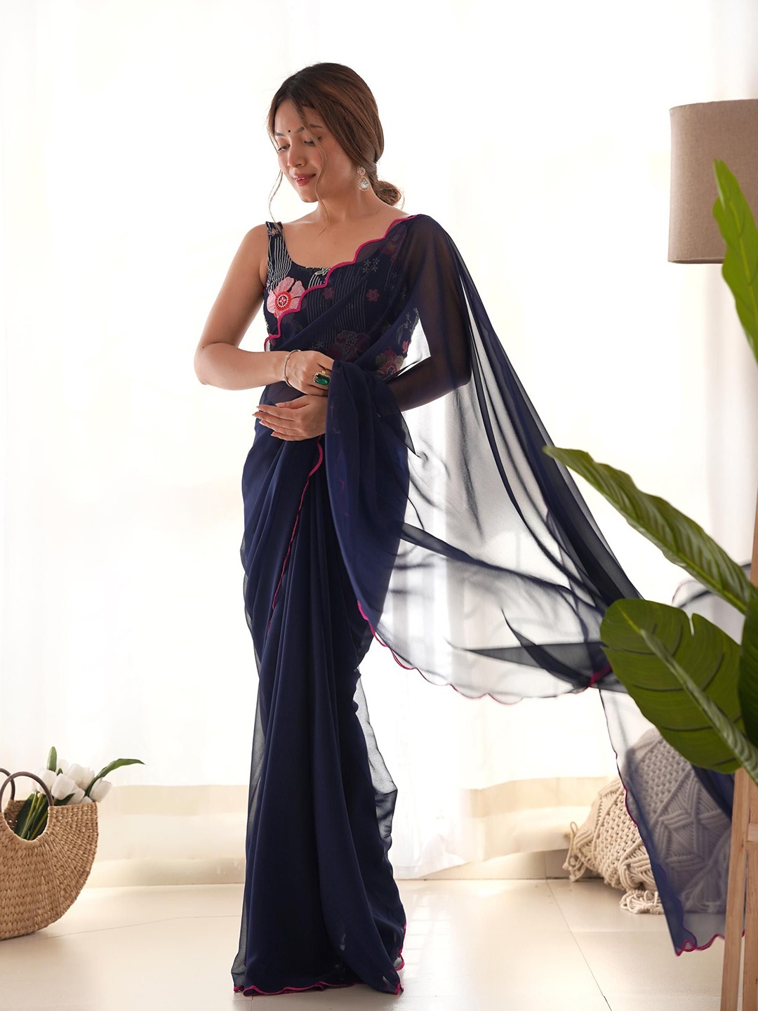 

Mitera Embroidered Pure Georgette Saree, Navy blue