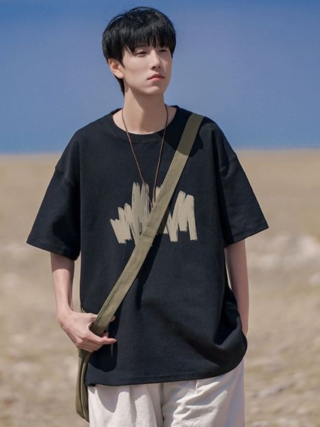

HERE&NOW Men Graphic Printed Round Neck Cotton Oversized T-shirt, Black