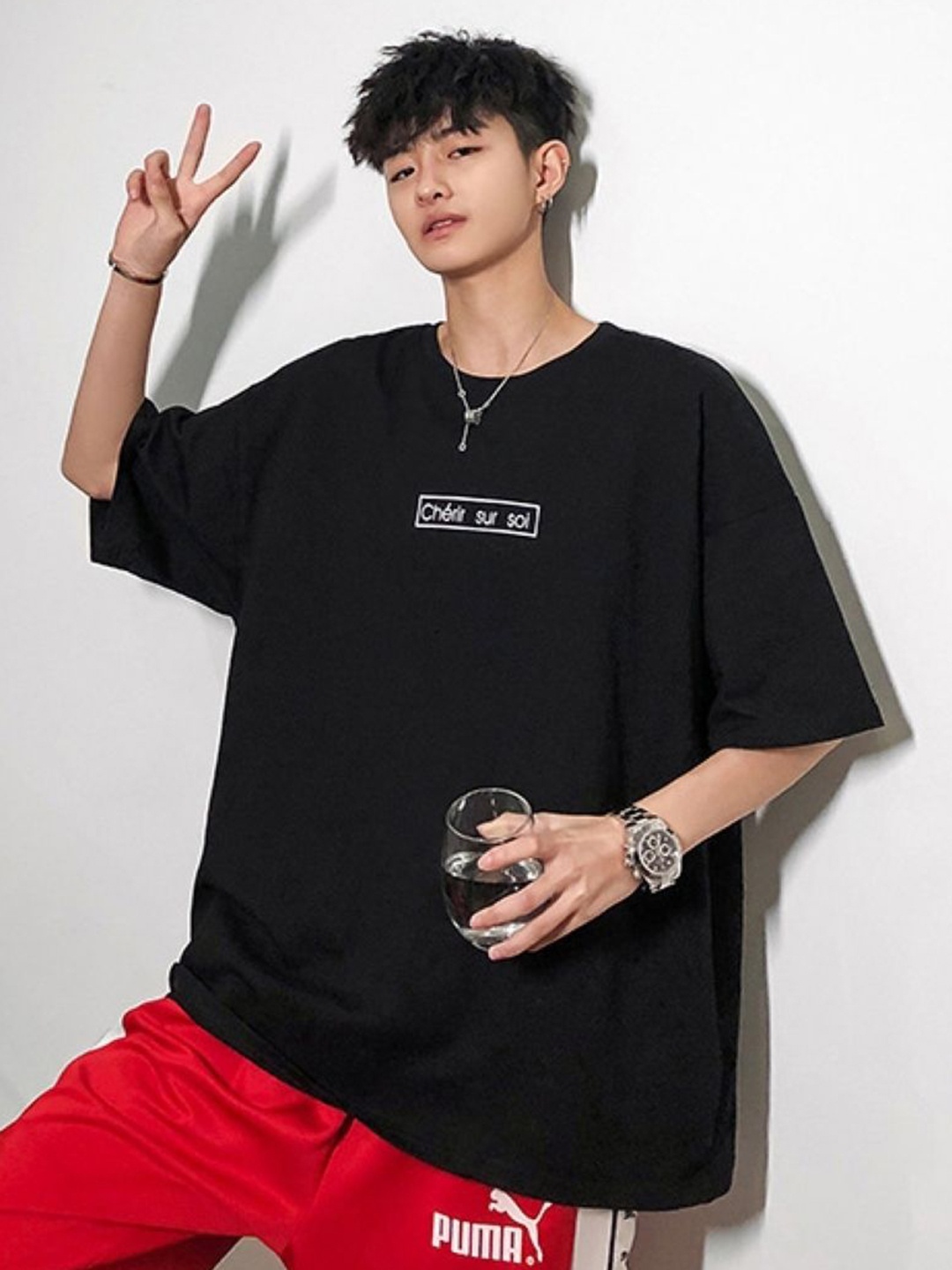 

HERE&NOW Men Typography Printed Round Neck Oversized T-shirt, Black