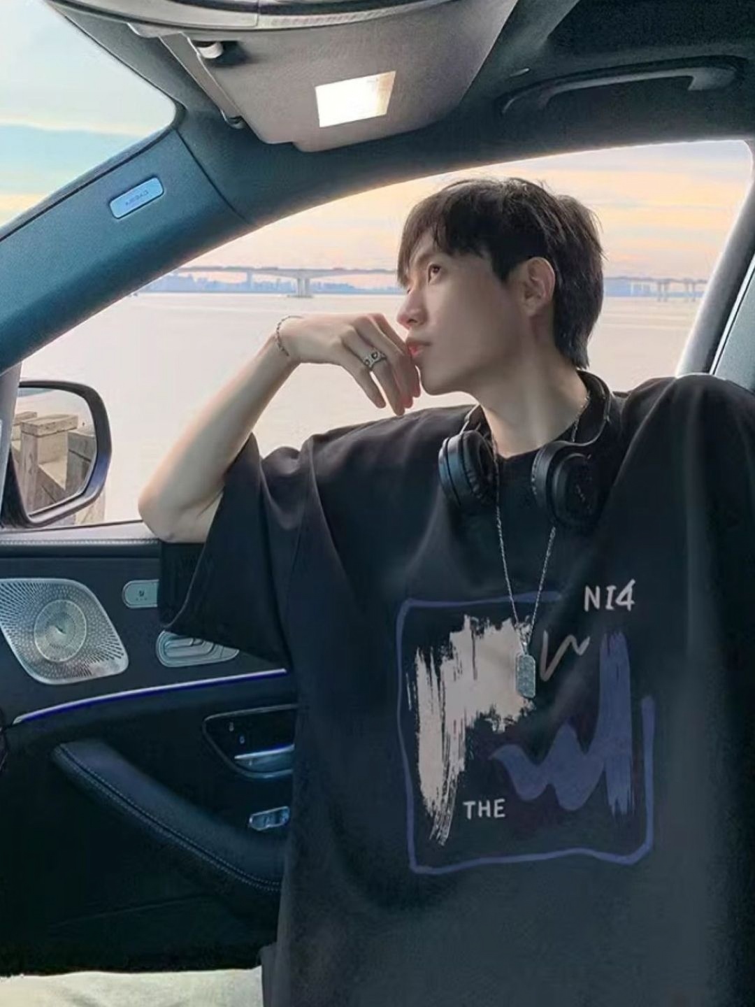

HERE&NOW Men Graphic Printed Round Neck Cotton Oversized T-shirt, Black
