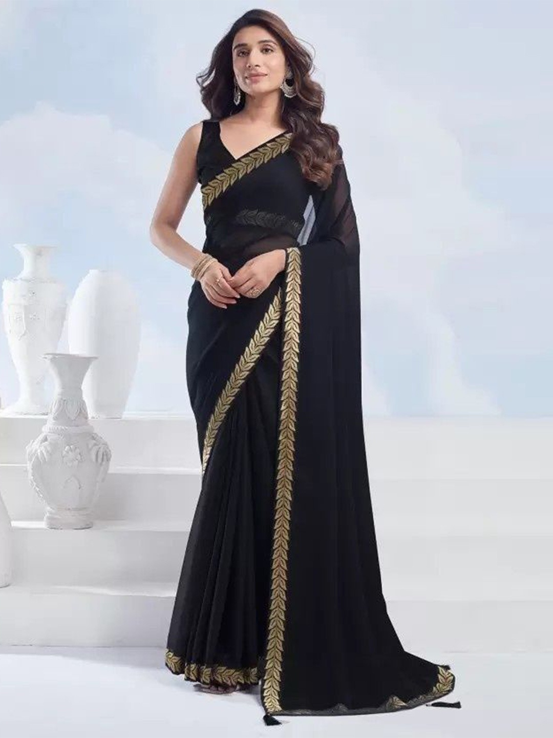 

Reboot Fashions Embroidered Pure Georgette Saree, Black
