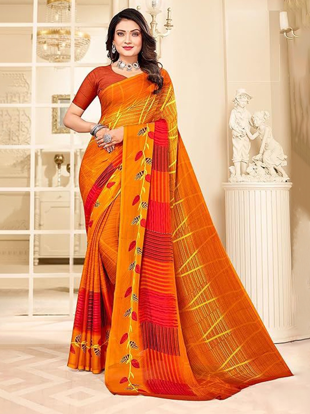 

Reboot Fashions Printed Pure Chiffon Saree, Mustard