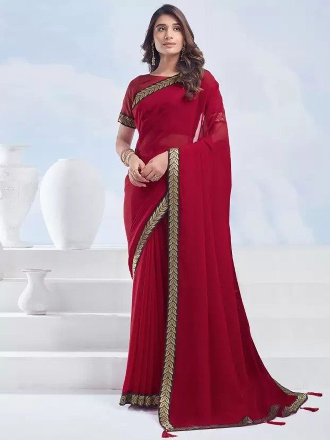 

Reboot Fashions Embroidered Pure Georgette Saree, Red