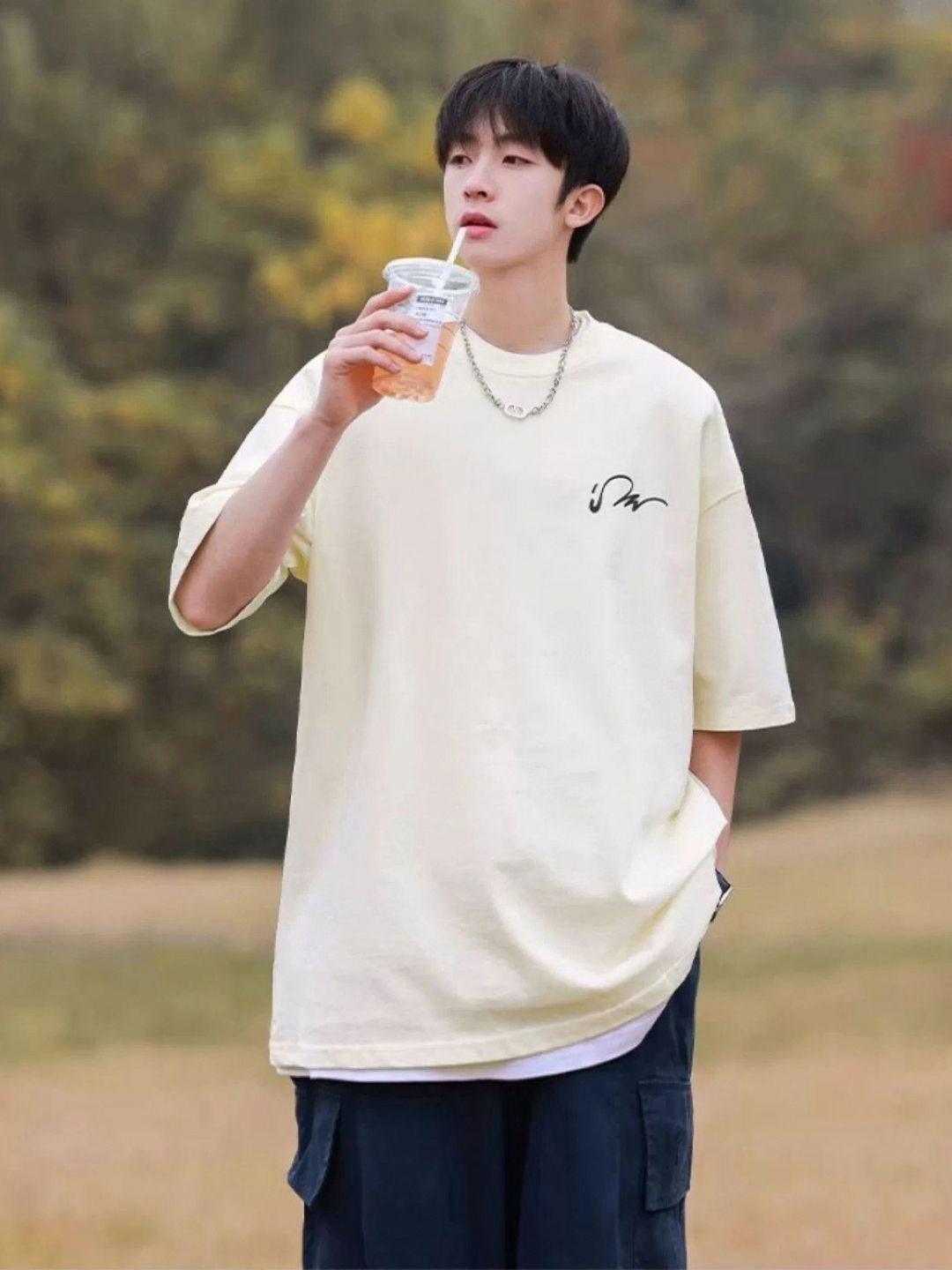 

HERE&NOW Men Graphic Printed Round Neck Oversized T-shirt, Cream