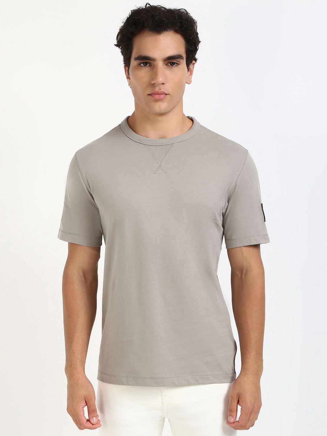 

Calvin Klein Jeans Men Solid Round Neck Cotton T-shirt, Grey
